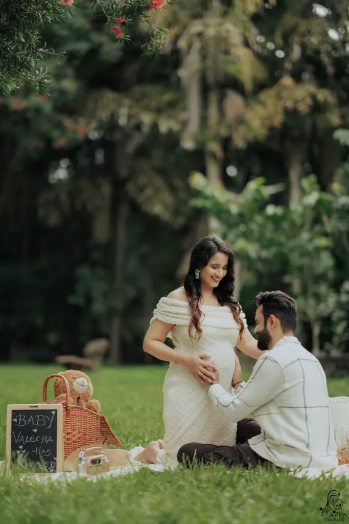 Expecting couple enjoying an outdoor maternity photoshoot in Pune captured by Me & Mom by DB ARTWORKS.