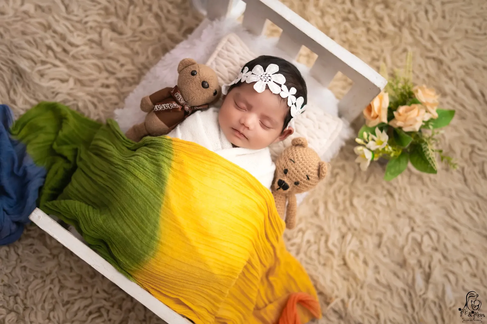 Soft colors and timeless newborn portrait styling.